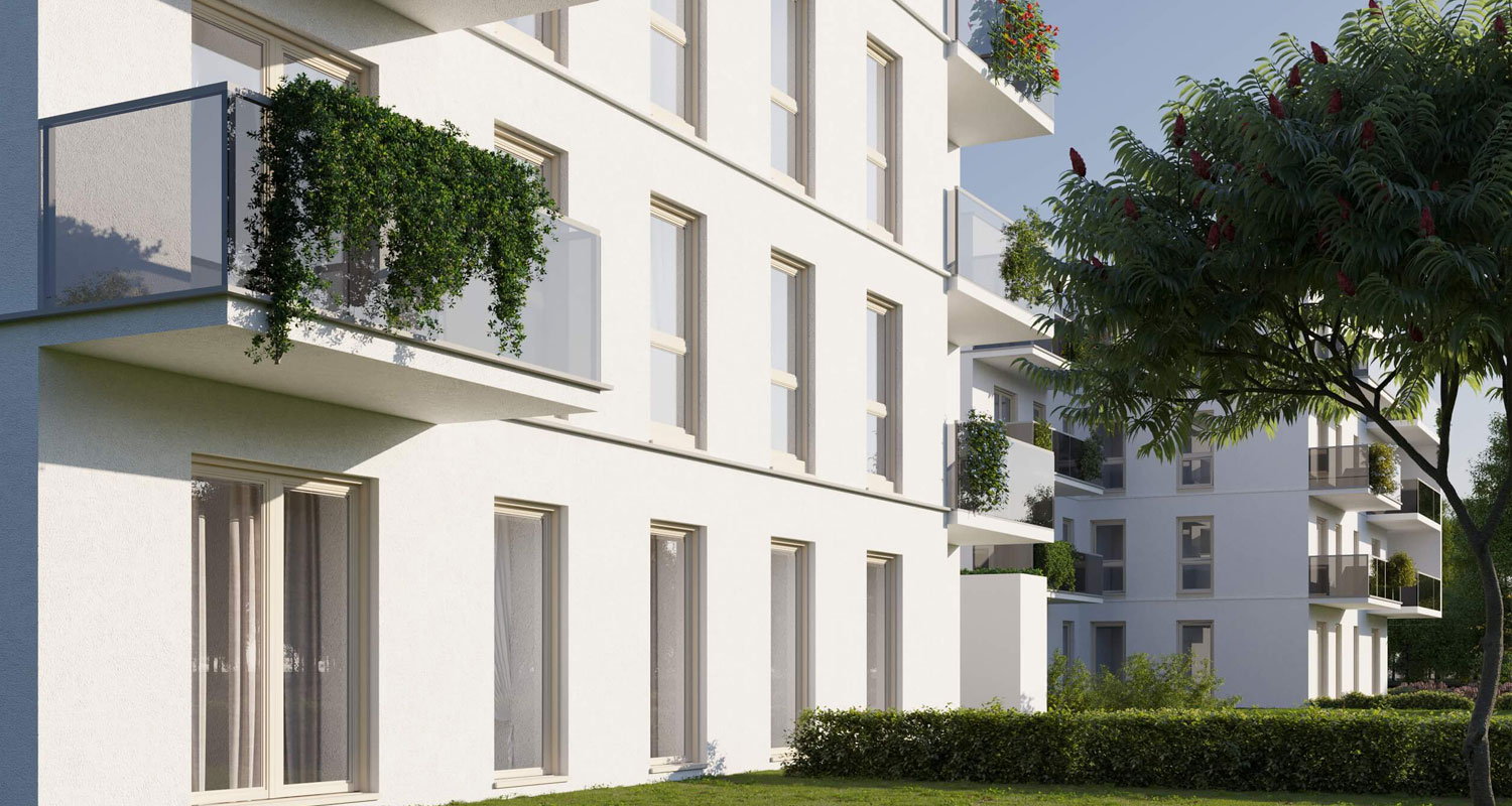 Widok na tył budynku, zielona trawa, balkony